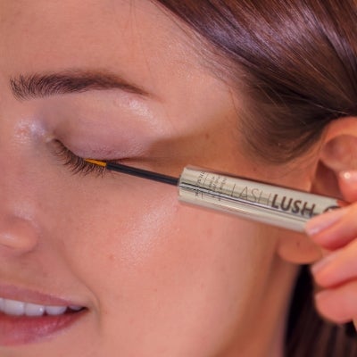 Woman applying LashLush onto her eye next to an image of a LashLush before and after