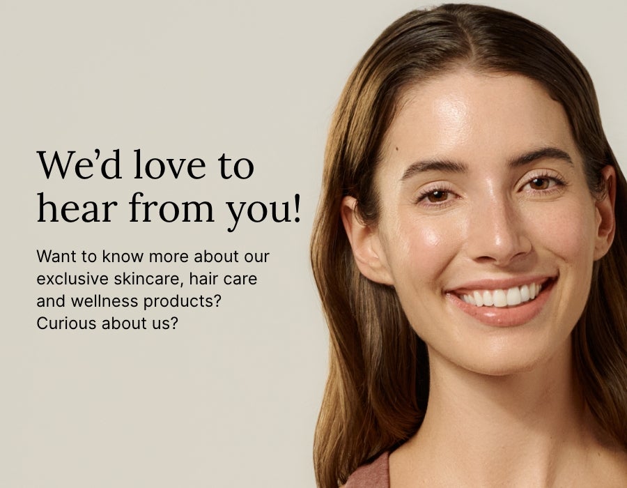 A headshot of a brown hair woman posing next to text that says “We'd Love to Hear from you!”